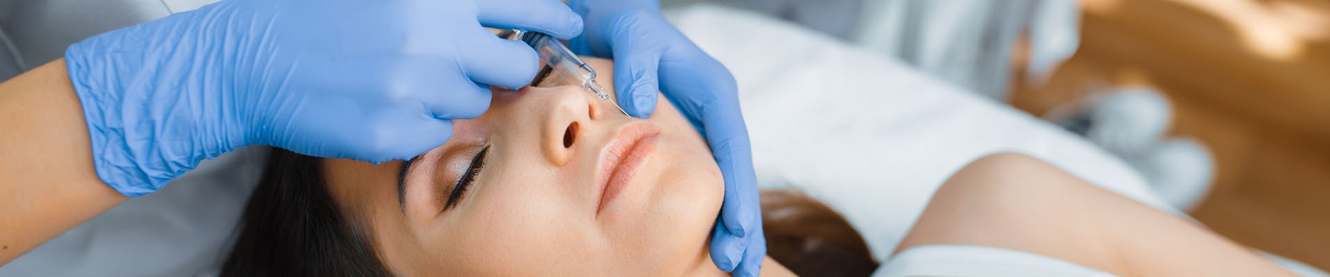 cosmetician-gives-face-botox-injections-to-patient copy